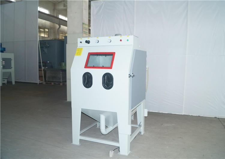 1678344952361602.jpg 6箱體式手動噴砂清理機.jpg